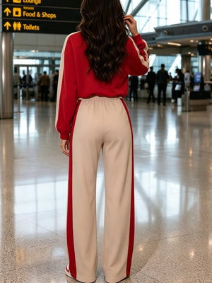 Completo da donna color block due pezzi, felpa con mezza zip e pantaloni a gamba larga, outfit casual da viaggio da donna — foto 2